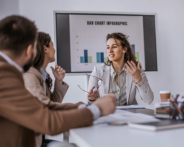 A team discussing and strategizing business ideas and ideas in a conference room.